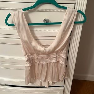 Brand new beautiful silk pink Flowy top. Never worn with tags !